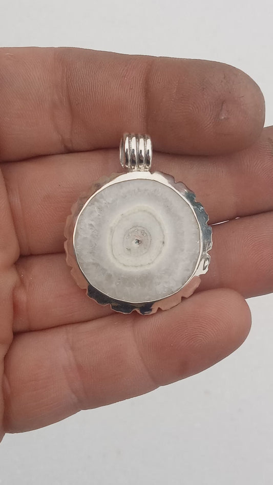 Solar quartz fine silver pendant with stars in the beze