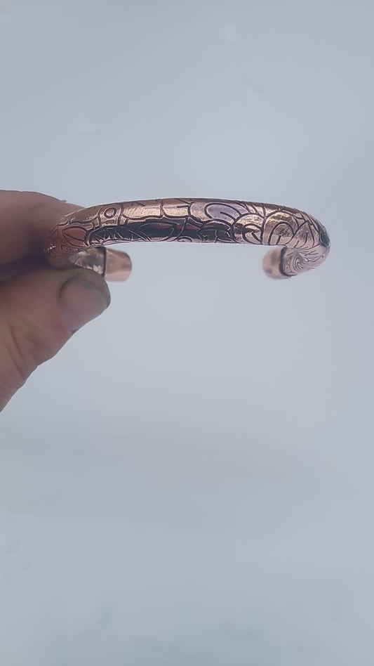 Floral pattern embossed pure copper cuff.