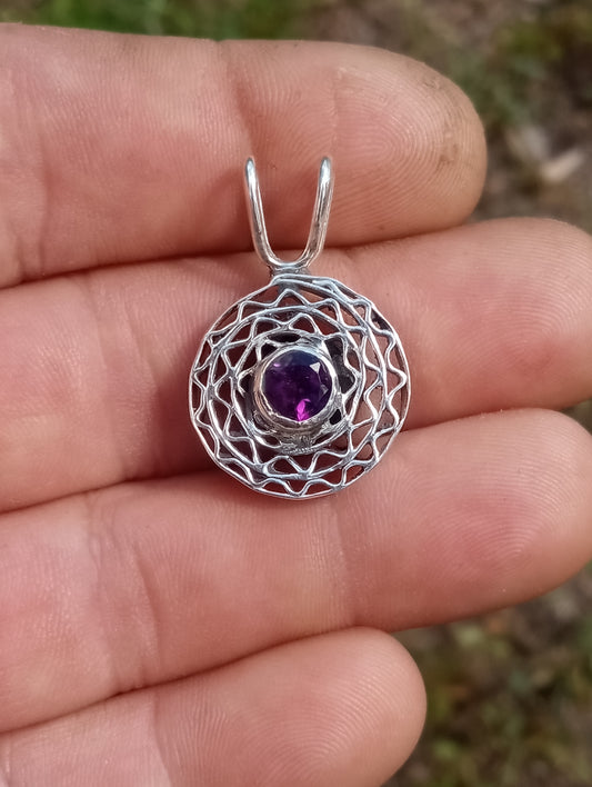 Custom handcrafted fine silver and amethyst pendant.