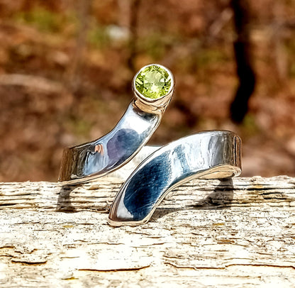 Brilliant cut peridot fine silver bypass ring
