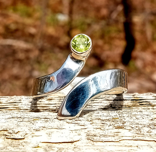 Brilliant cut peridot fine silver bypass ring