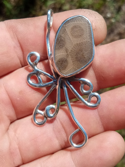 Handcrafted pure .999 fine silver octopus and Petoskey stone fossil pendant