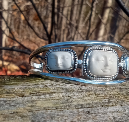 Exquisite handcrafted face cuff and fine silver .