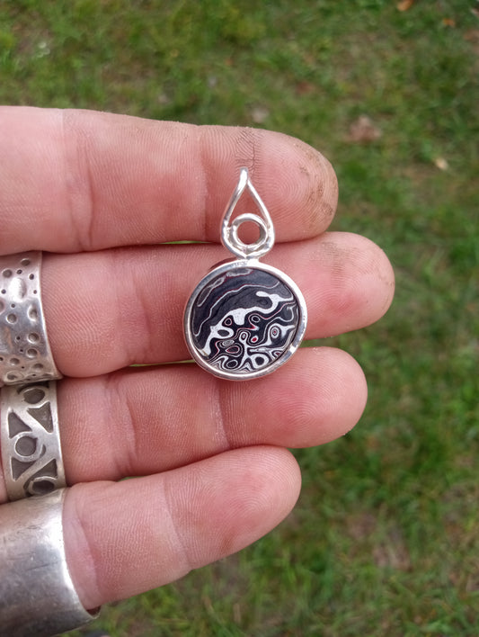 Handcrafted Fordite and fine silver pendant