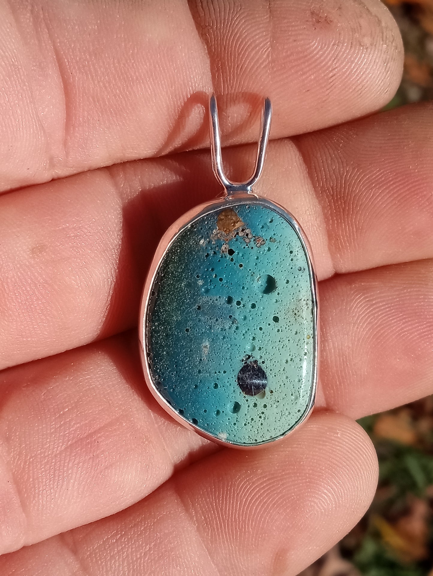 Gradient Leland blue pendant with iron ore set in fine silver