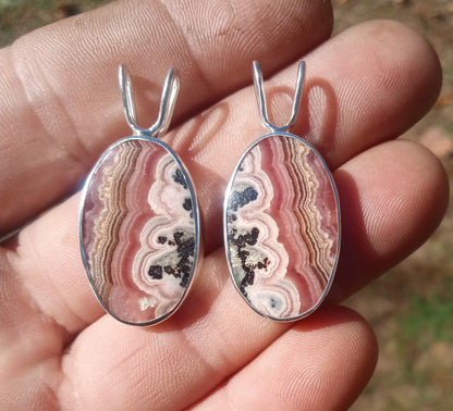 A perfect pair of Rhodochrosite pendants