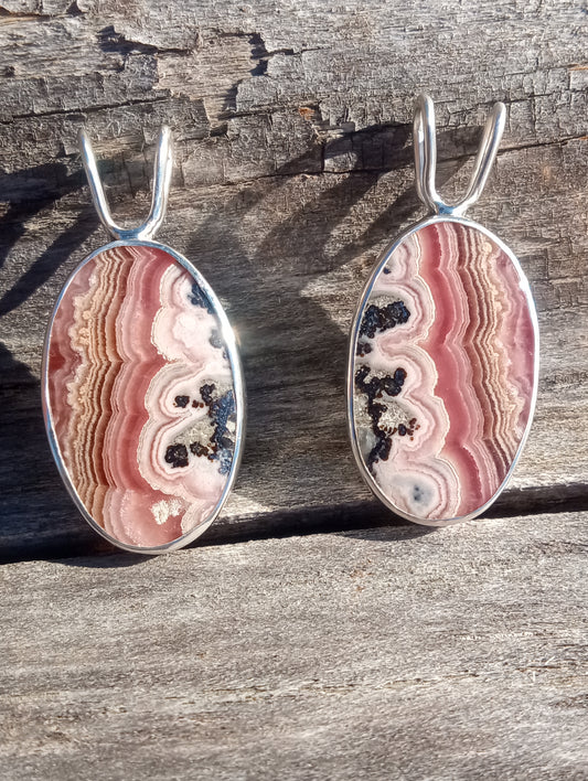 A perfect pair of Rhodochrosite pendants