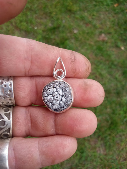 Handcrafted Fordite and fine silver pendant